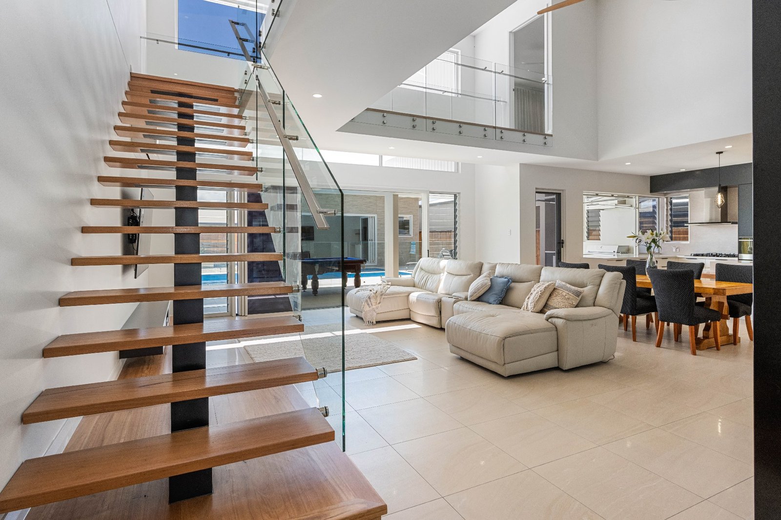 Divine — high-end residential interior, staircase and living area